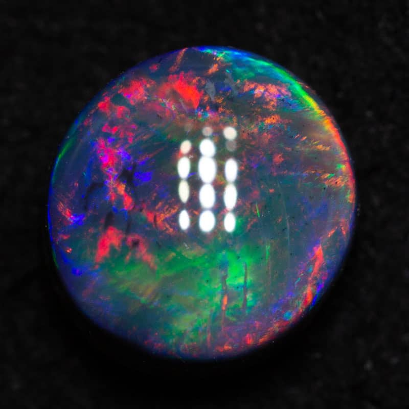 1.05 ct black opal gem 7x6.5x3.5mm - Image 2