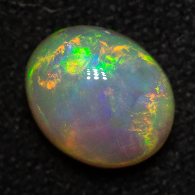 1.05 ct crystal opal 7.2x6x4mm - Image 4