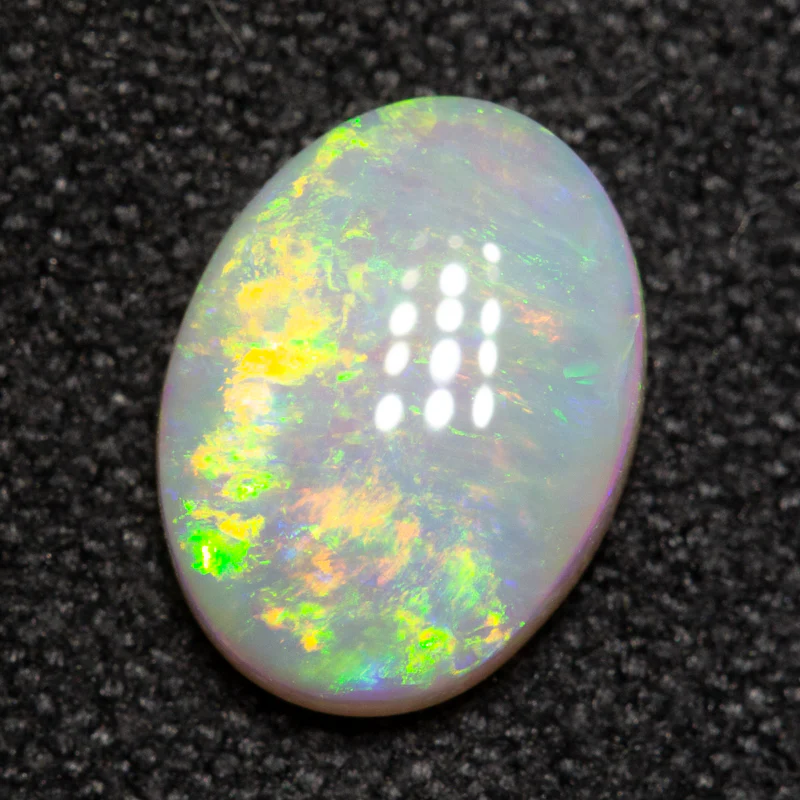 1.05 ct white opal 8.7x6.5x2.7mm - Image 2