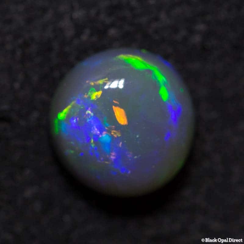 1.06 ct black opal 6mm round x4mm - Image 3