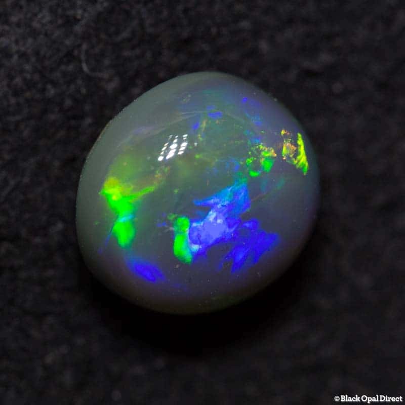 1.06 ct black opal 6mm round x4mm - Image 4