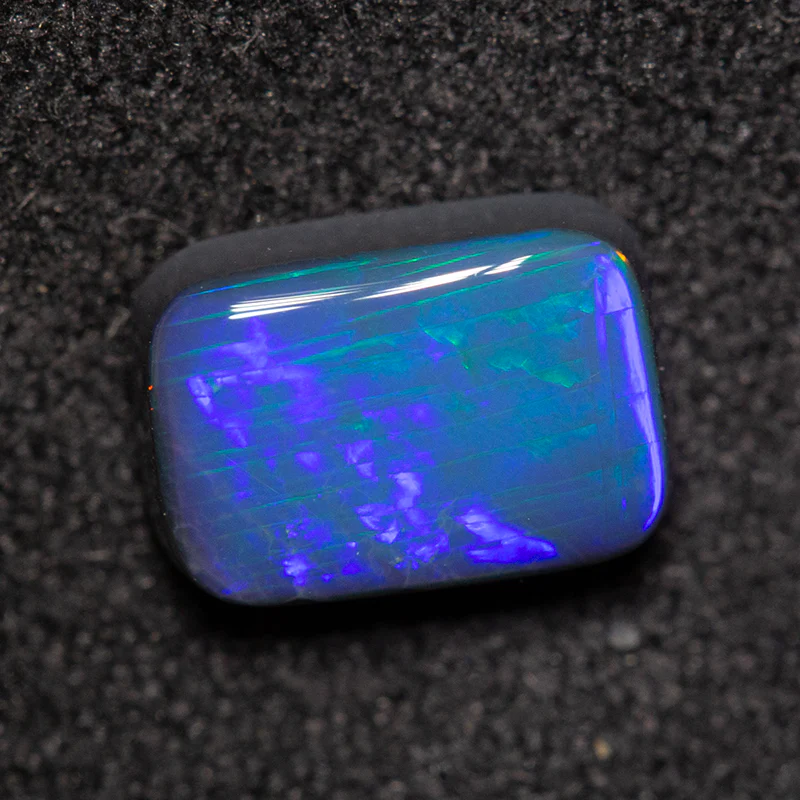 1.06 ct black opal 7.8x5.5x2.8mm - Image 3