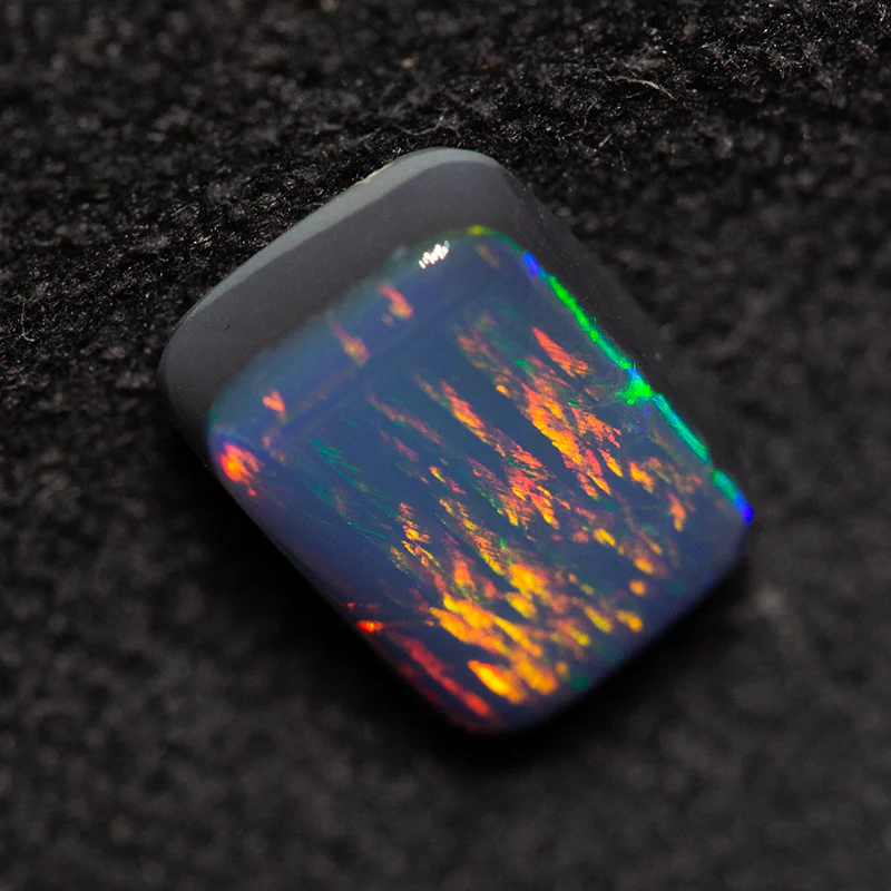 1.06 ct black opal 7.8x5.5x2.8mm - Image 4