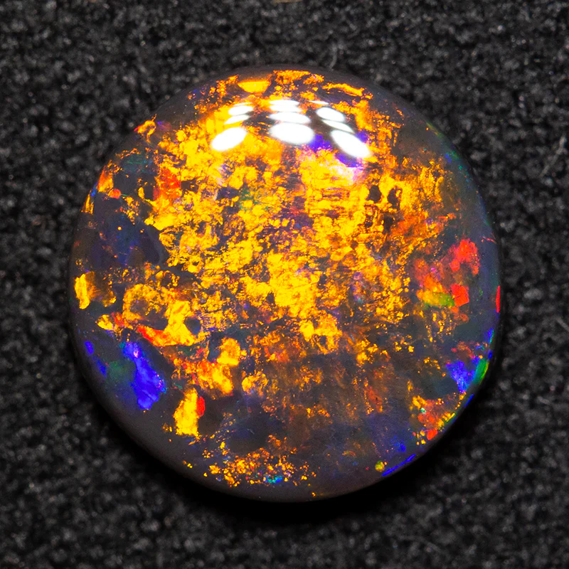 1.06 ct black opal 8.3x8.3x2.2mm - Image 2