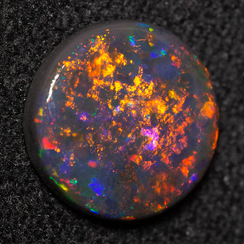 1.06 ct black opal 8.3x8.3x2.2mm - Image 3