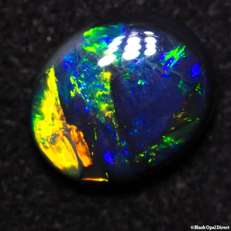 1.06 ct black opal 8x6.5x3mm - Image 2
