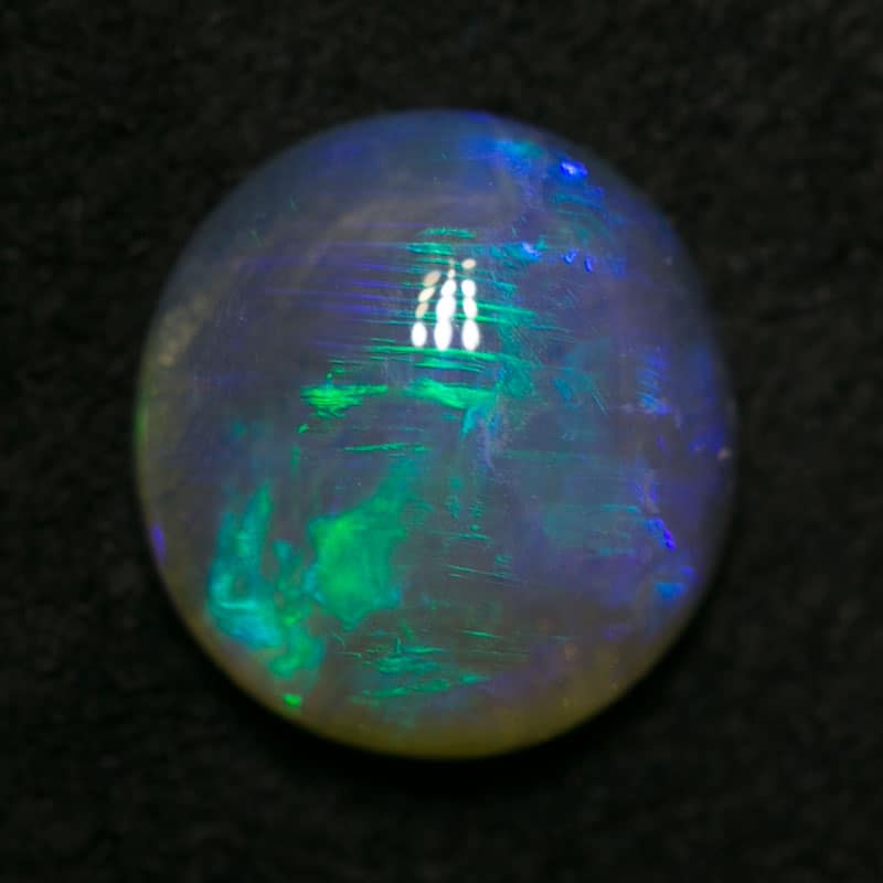 1.06 ct cats eye pattern crystal opal 7.5x7x3mm - Image 2