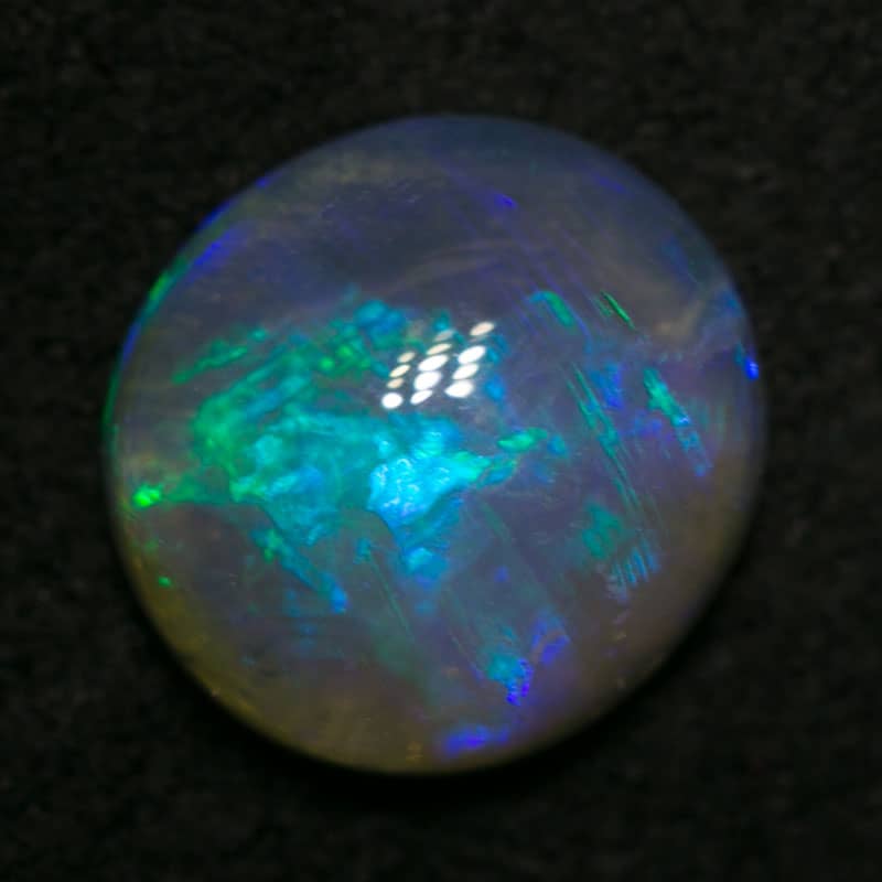 1.06 ct cats eye pattern crystal opal 7.5x7x3mm - Image 3