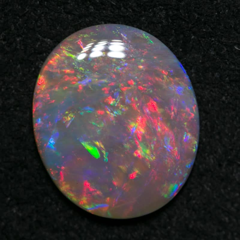 1.06 ct dark opal 10x8.5x1.5mm - Image 2