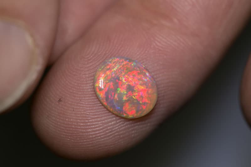 1.06 ct dark opal 10x8.5x1.5mm - Image 3