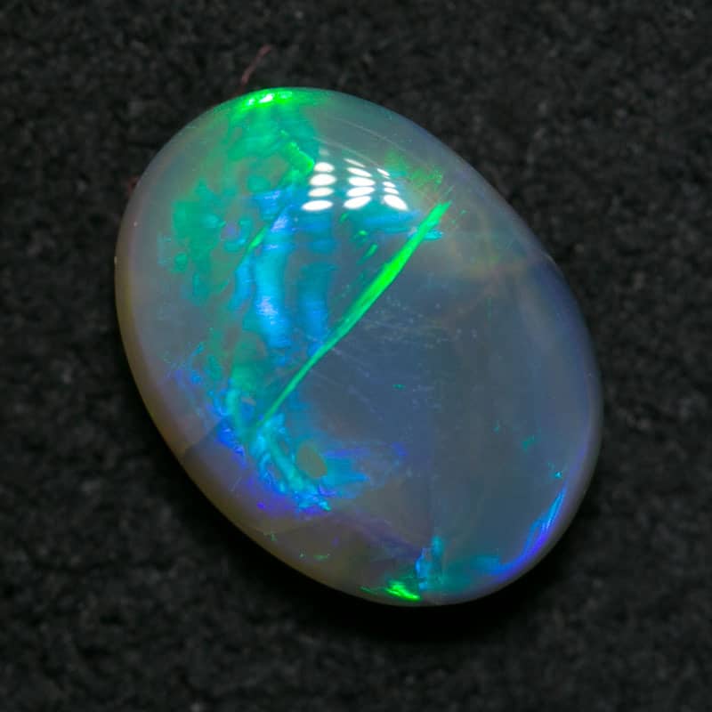 1.06 dark crystal opal 8x7x2mm - Image 2
