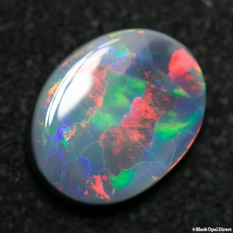 1.07 ct semi black opal 9x7x2mm - Image 4
