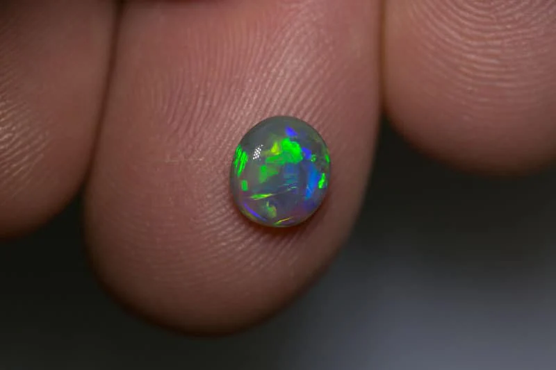 1.08 ct dark opal 7x6.5x3mm - Image 2