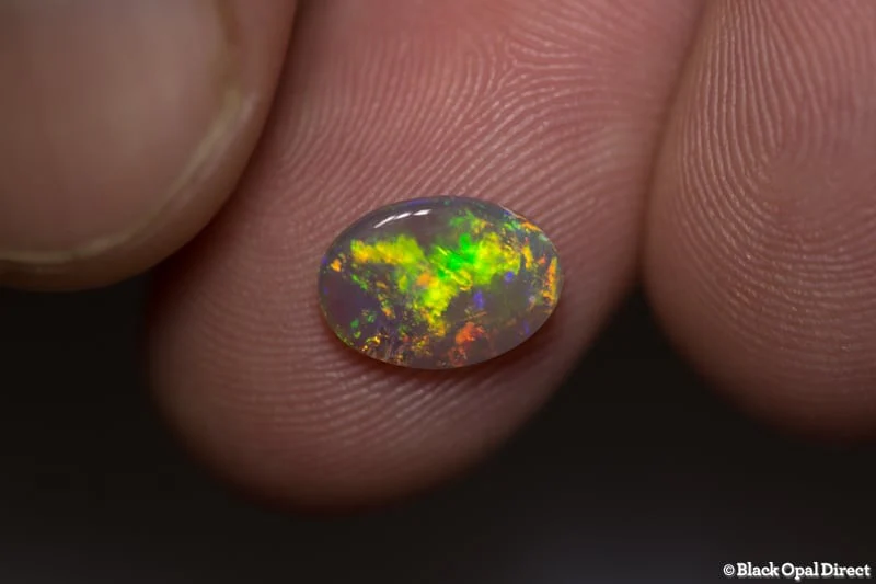 1.08 ct green orange crystal opal 10x7x2mm - Image 2