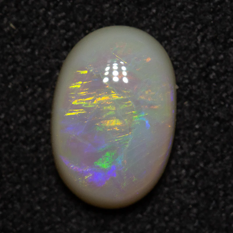 1.08 ct white opal 8.7x6x3mm - Image 2