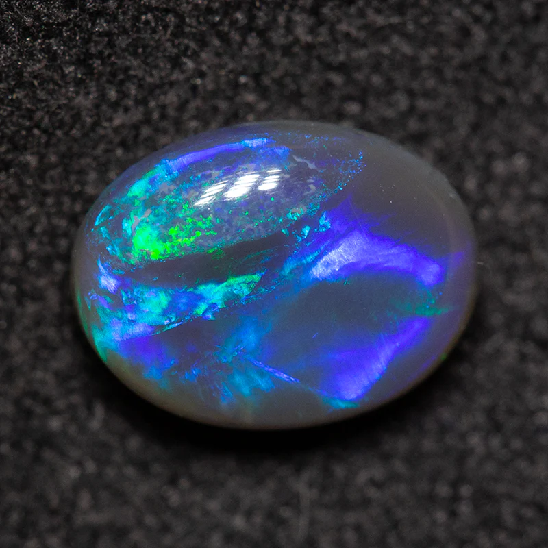 1.09 ct black opal 8.1x6.1x3.3mm - Image 2