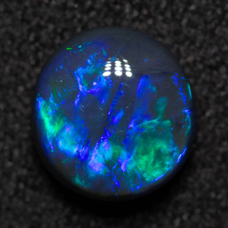 1.10 ct black opal 6.9x6.6x3.9mm - Image 2