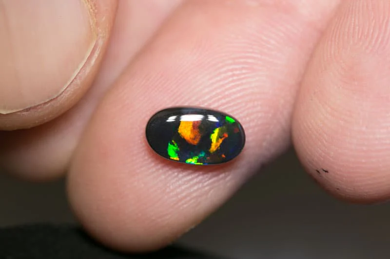 1.10 ct black opal 9.5x5x3mm - Image 2