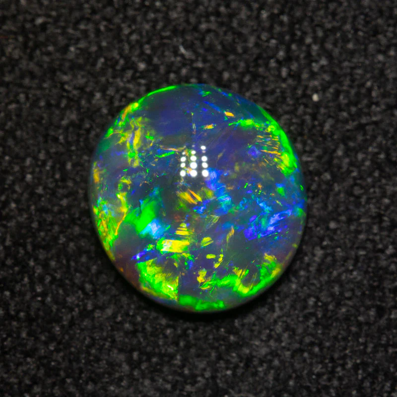 1.11 ct black crystal opal 7.6x7.1x3.3mm - Image 2