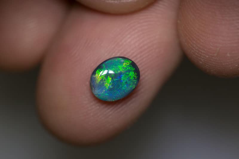 1.12 ct black opal 8x6x3mm - Image 2