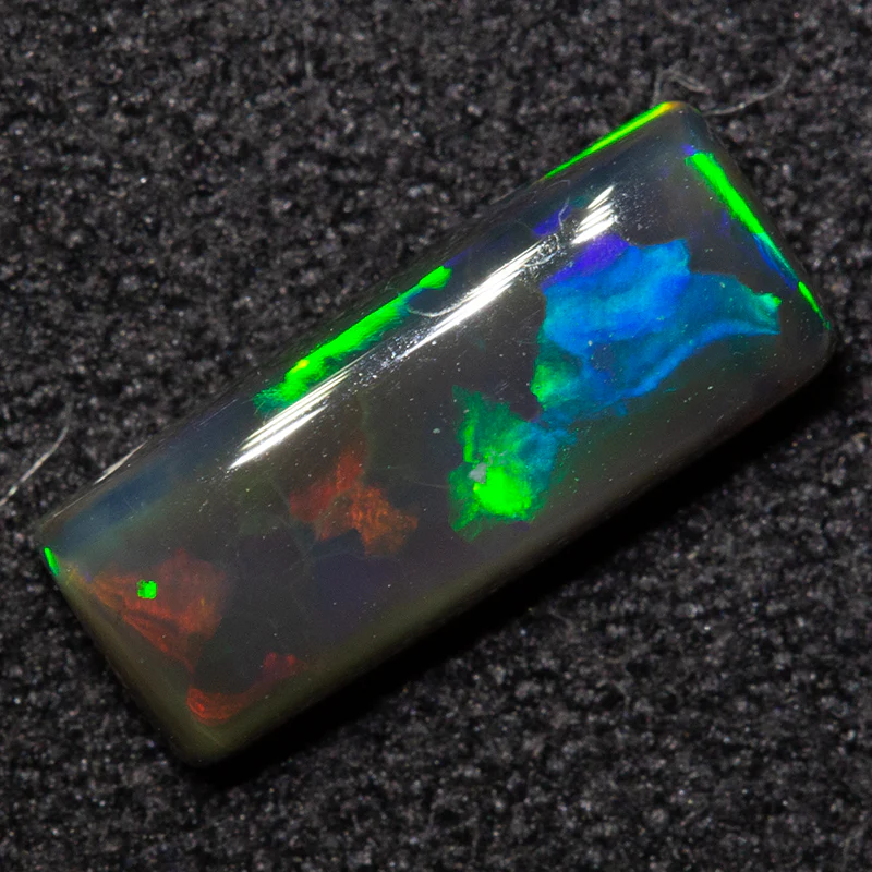 1.15 ct black opal 10.4x4.3x3mm - Image 2