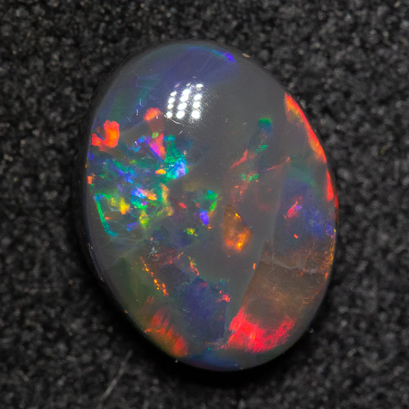 1.15 ct black opal 8.3x6.5x3.4mm - Image 2