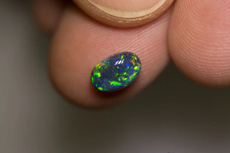 1.15 ct black opal 8.5x5x4mm - Image 2
