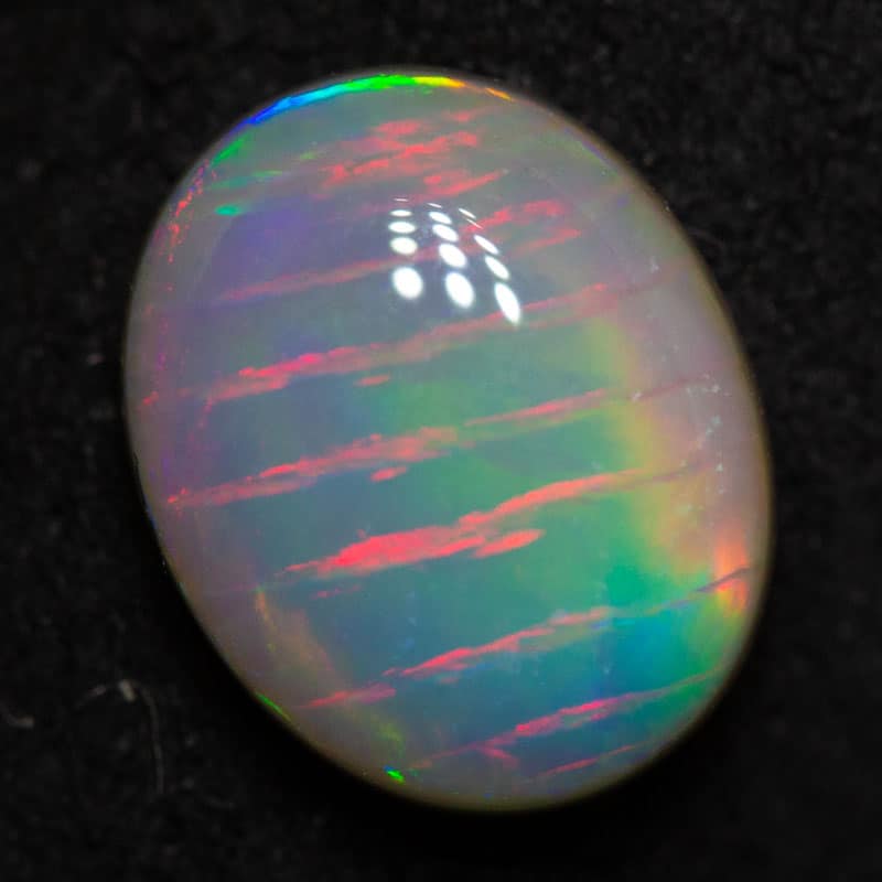 1.17 ct dark fish scale pattern opal 8.3x6.8x3.2mm - Image 2