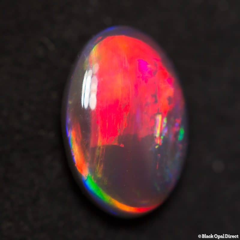 1.19 ct red on black opal gem 9x6x3mm - Image 2