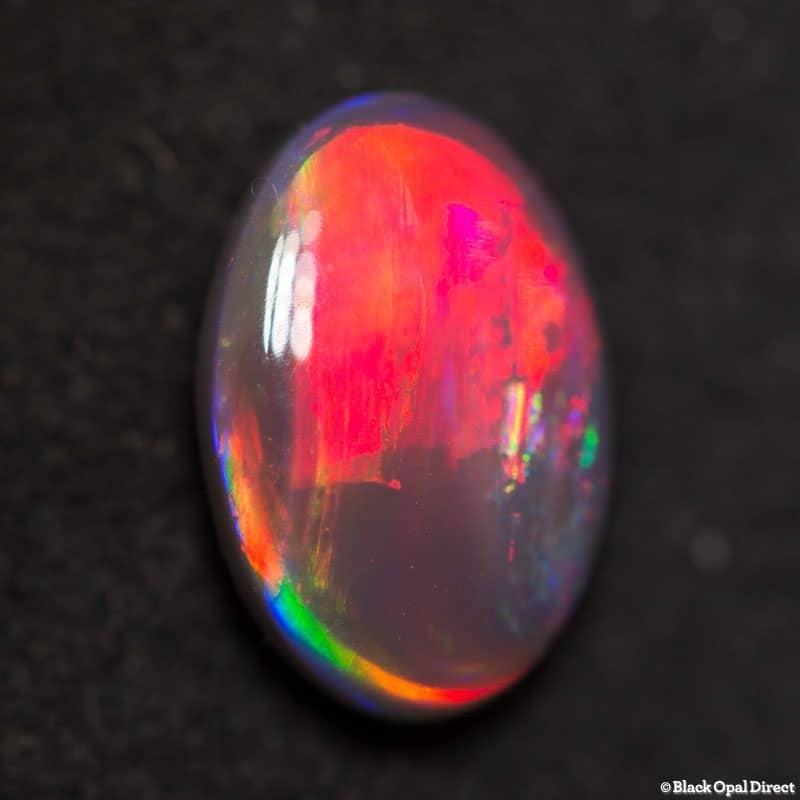 1.19 ct red on black opal gem 9x6x3mm - Image 5