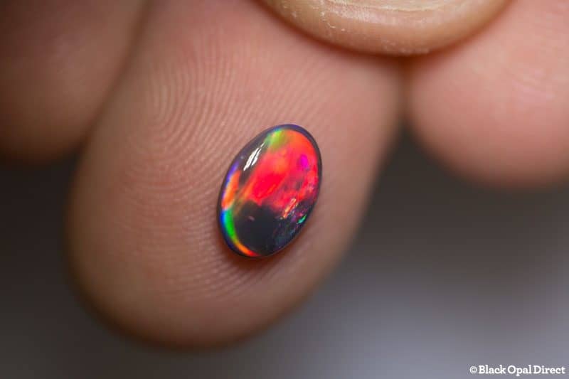 1.19 ct red on black opal gem 9x6x3mm - Image 8