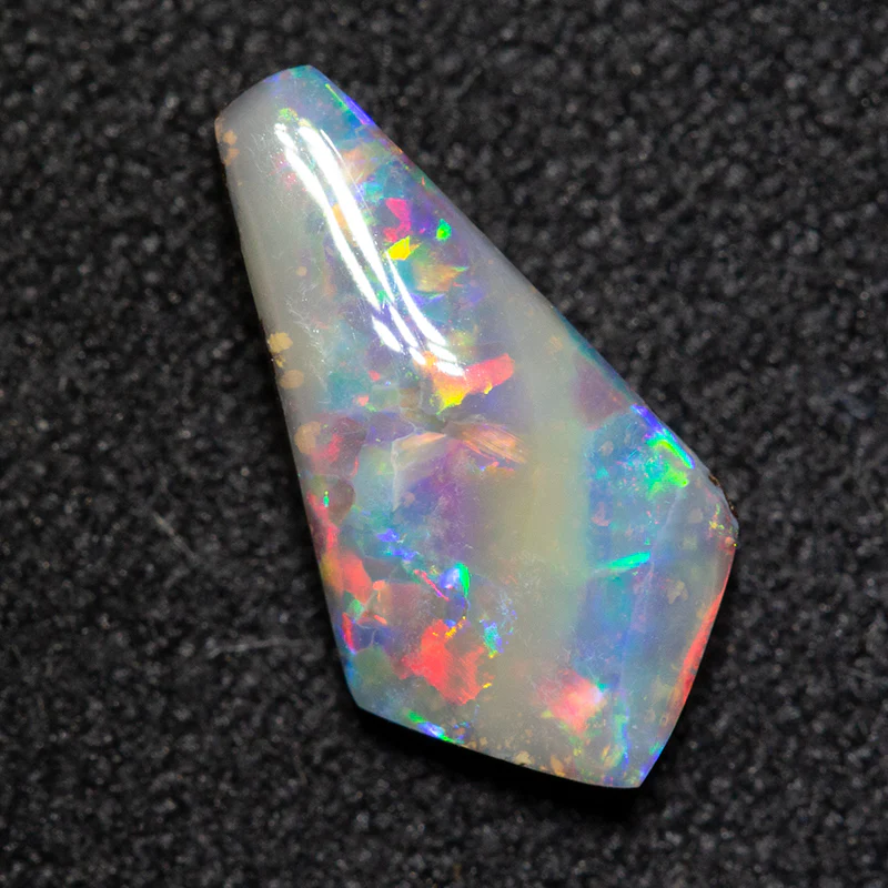 1.22 ct boulder opal 11.2x5.9x2.8mm - Image 4