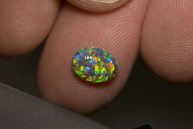 1.22 ct double sided black crystal opal 9x7x3.5mm - Image 4