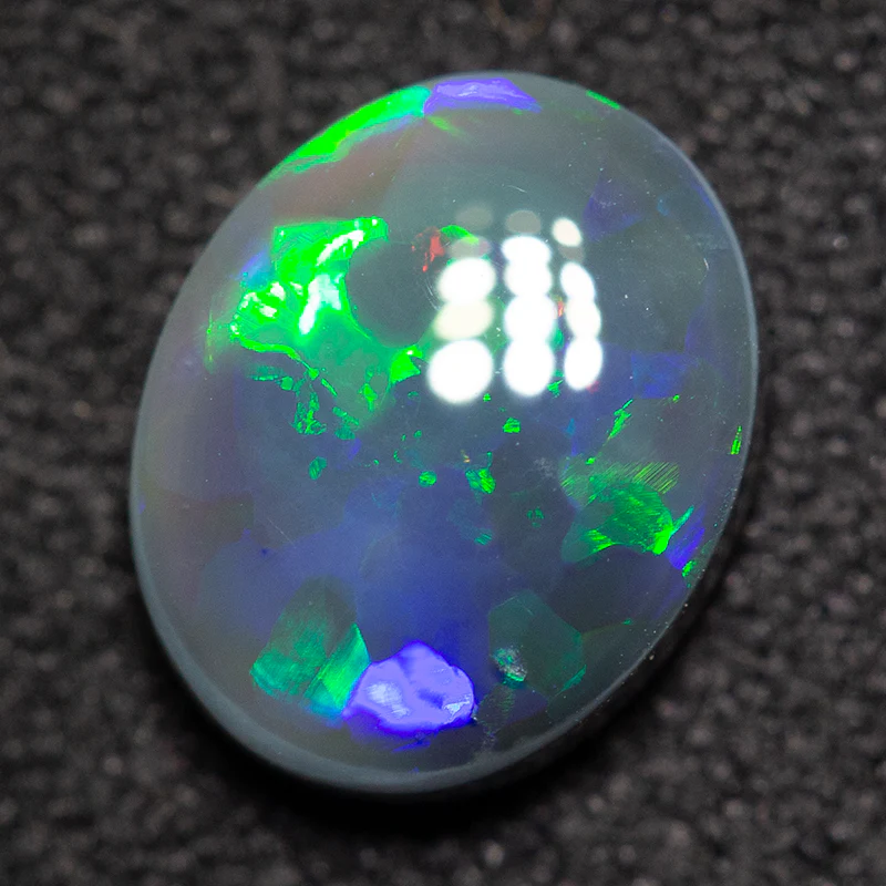 1.23 ct black opal 8.6x6.9x3mm - Image 2