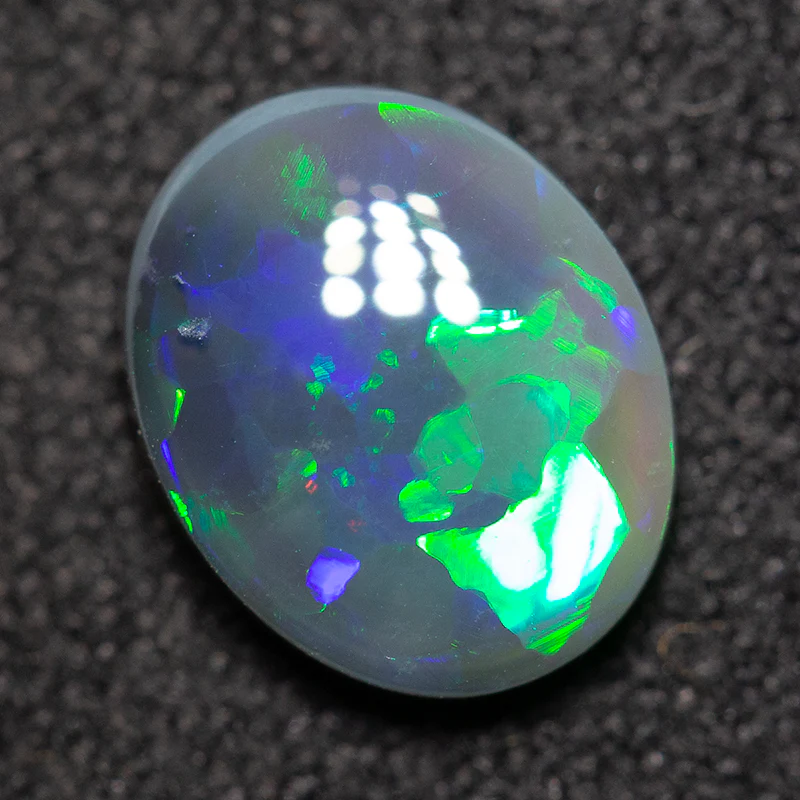 1.23 ct black opal 8.6x6.9x3mm - Image 3