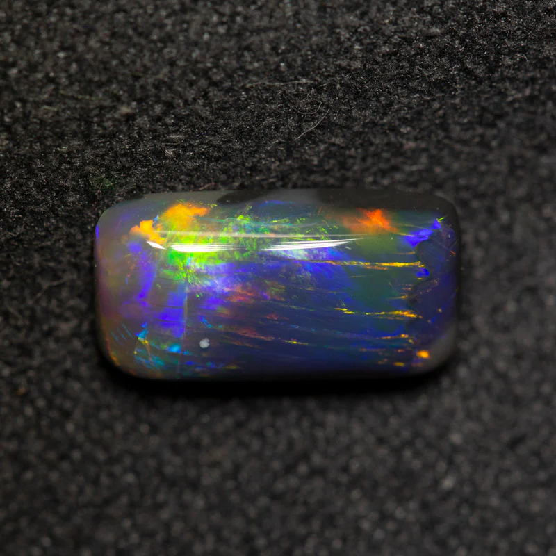 1.24 ct black opal 10.1x5.2x2.9mm - Image 2