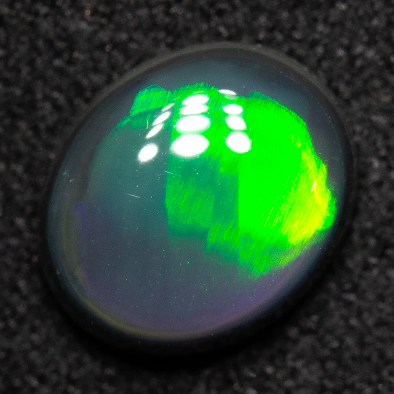 1.24 ct black opal 7.9x6.6x3.6mm - Image 2