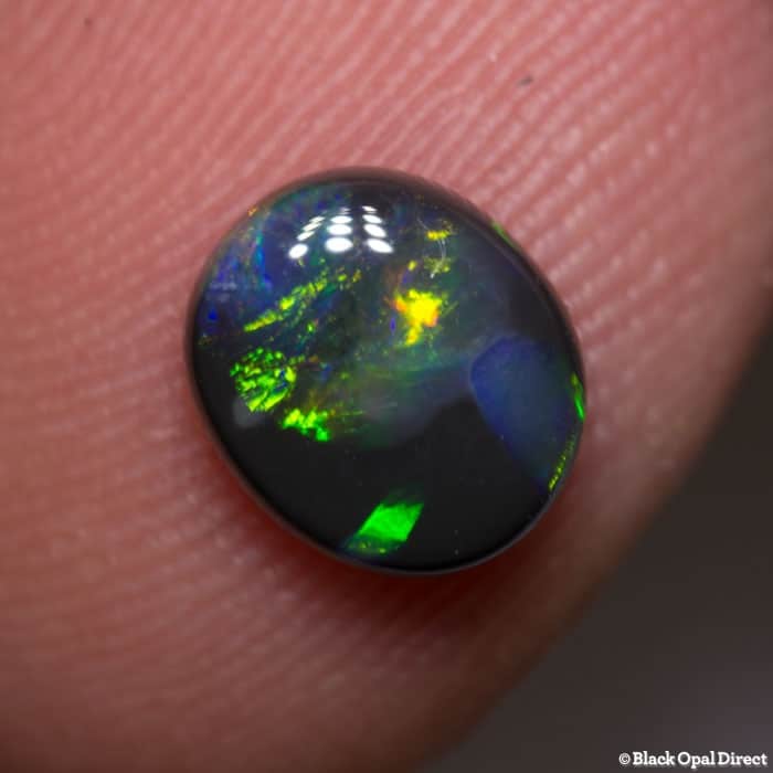 1.24 ct black opal 8x6.5x3mm - Image 2