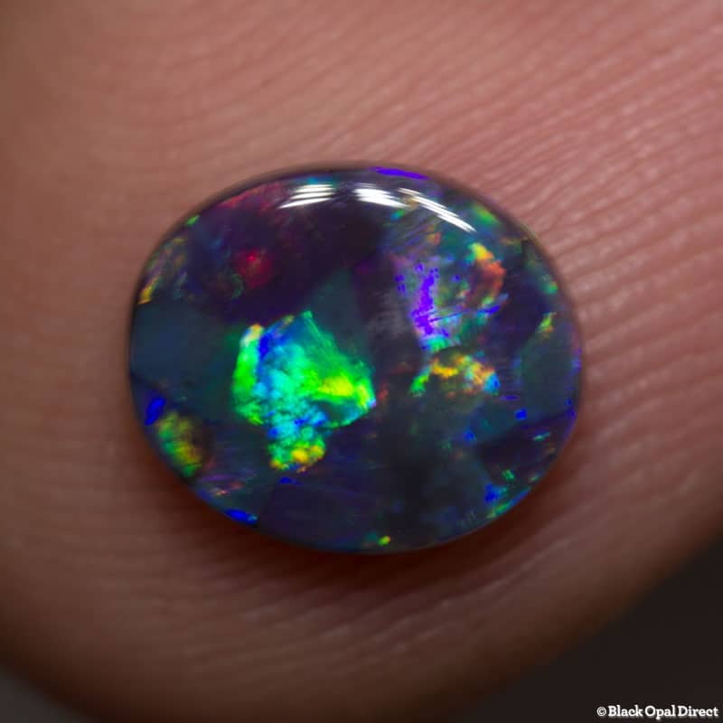 1.24 ct gem black opal 9x7.5x2mm - Image 2