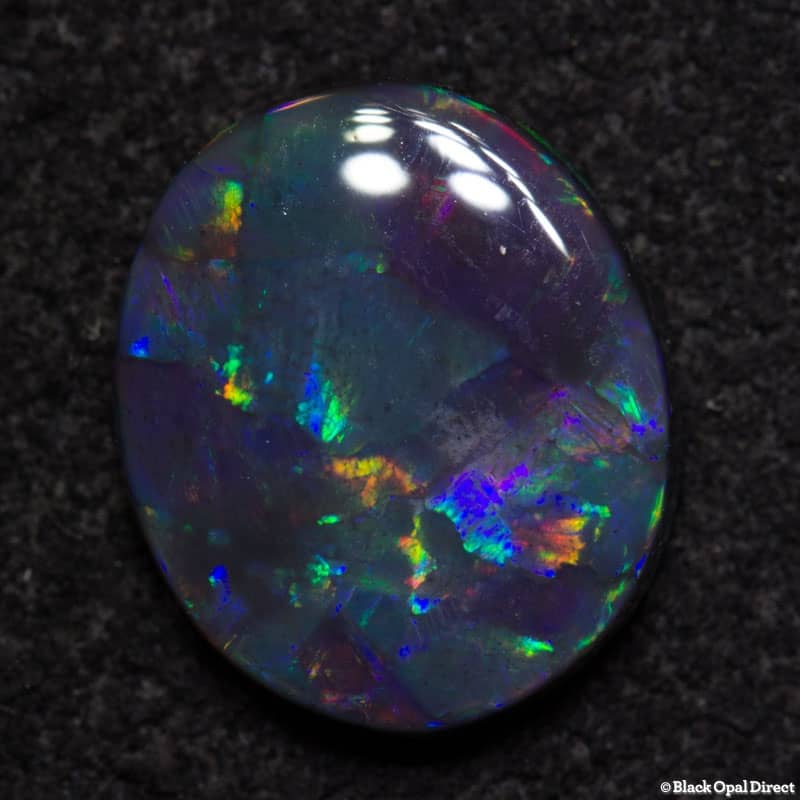 1.24 ct gem black opal 9x7.5x2mm - Image 3