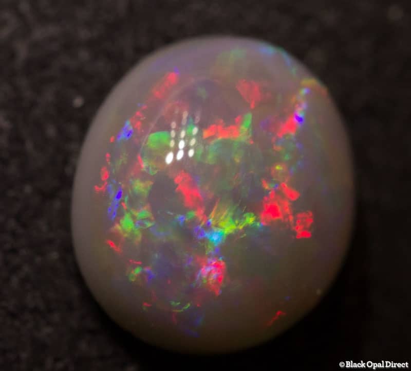 1.24 ct semi black opal 7.5x7x4mm - Image 2