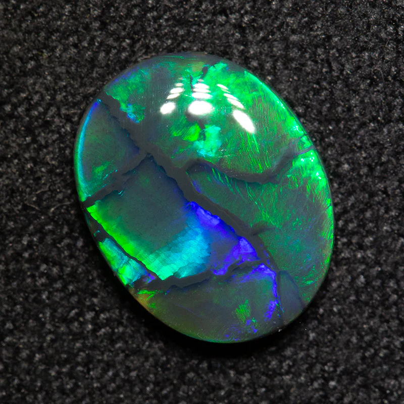 1.25 ct black opal 9.6x7.6x2.6mm - Image 2
