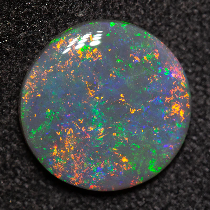 1.26 ct black opal 9.5x9.4x2.1mm - Image 2