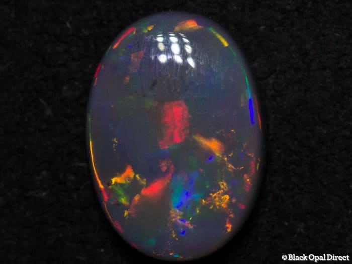 1.26 ct semi black opal 9x7x3mm - Image 2