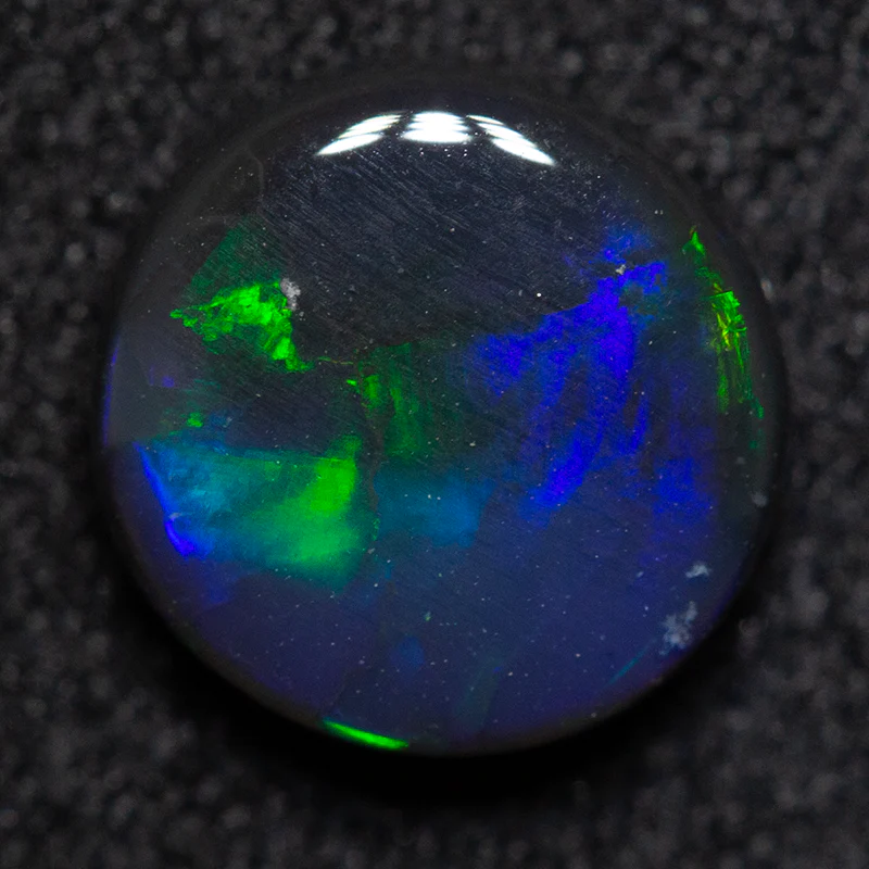 1.27 ct black opal 7.7x7.5x2.8mm - Image 2