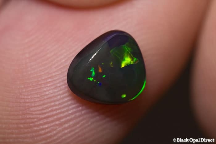 1.28 ct baroque black opal 8x7x3mm - Image 3