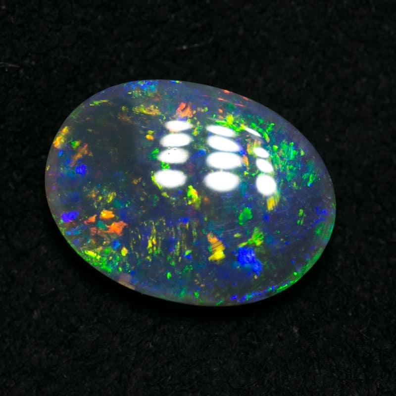1.28 ct black crystal opal 9.5x7x3mm - Image 6