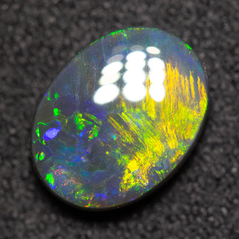 1.28 ct black opal 9.2x7x3mm - Image 2