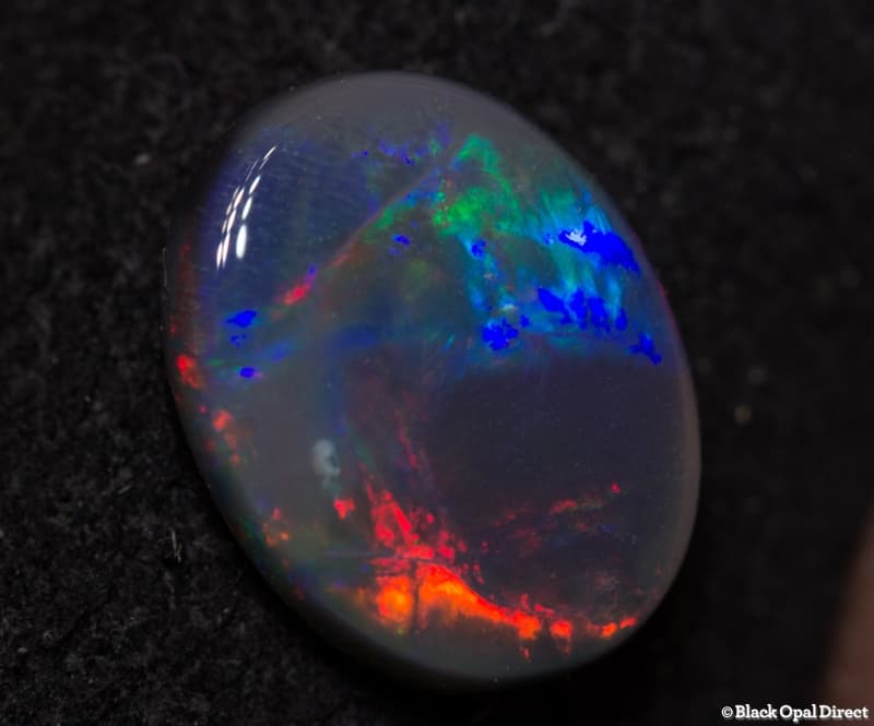 1.28 ct black opal 9x7x3mm - Image 2