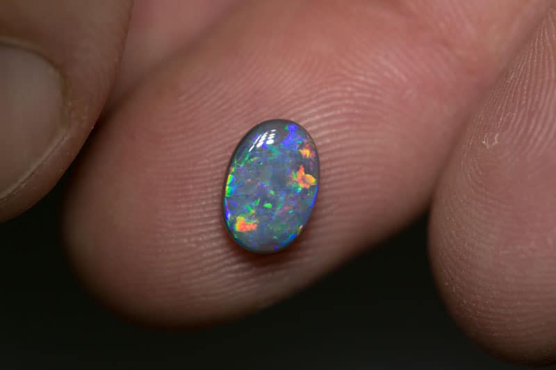 1.28 ct dark opal 9x6x3mm - Image 2